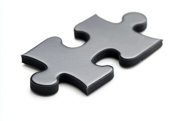 Obraz premium Black silhouette of a puzzle piece on a white background.