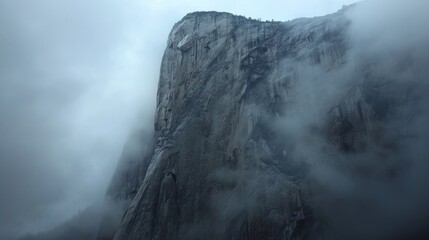 Majestic Mountain Peak in Mist