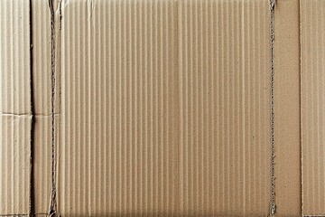 A flat, high-resolution, top-down view of a brown cardboard texture. High quality