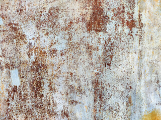 Rustic textured surface with peeling paint showcasing aged beauty and wear in a vintage setting, perfect for creative design projects
