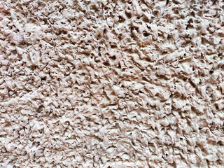 A textured surface with a distinctive pattern in soft, earthy colors, ideal for backgrounds or creative design applications