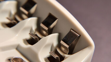 Close-up of contacts inside for rechargeable battery.