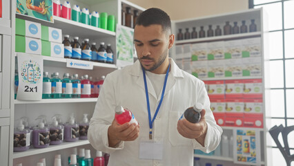 A professional hispanic man comparing products in a pharmacy, surrounded by shelves filled with...