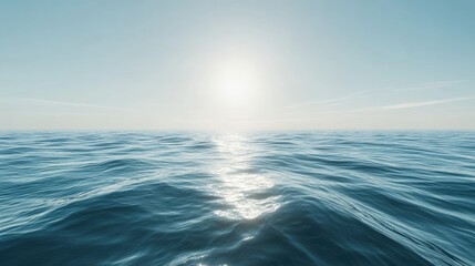 Obraz premium A serene sea surface with light waves gently moving under the afternoon sun, creating smooth reflections.
