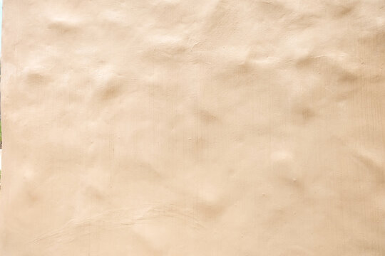 Brown clay mud grunge cement texture wall background,Desert House in Summer tropical,mediterranean architectureminimal concept,Old traditional house wall texture,copy space.