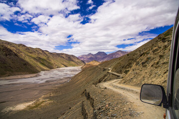 winding risky treacherous roads leading to heavenly destination in horizon