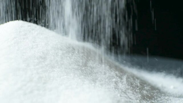 White Finely Ground Rock Salt Pour Slow Motion.
