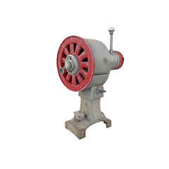 Obraz premium Vintage Industrial Machine with Red Wheel