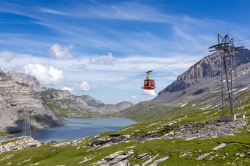 mountain landscape with lake and a gondola in summer, in Gemmi Leukerbad, Switzerland