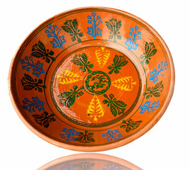 An attractive design hand made clay dish plate isolated on white background