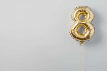 Gold number 8 foil balloon with pastel blue and pink balloons for eighth birthday celebration, event decoration, or festive party design with a minimal and elegant aesthetic