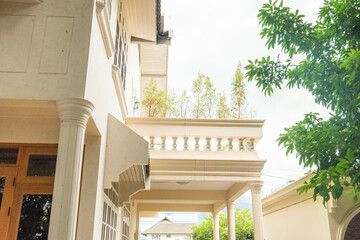 Side view of modern rooftop terrace,Luxurious old apartament house with terrace,Home exterior, garden,cozy home concept.