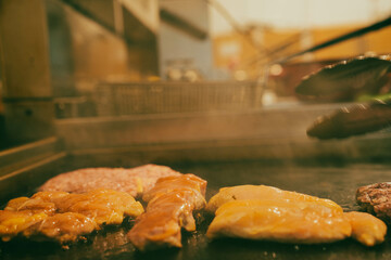 A steak sizzling in the heat of an oven. Perfect for ads focused on premium grilled or oven-cooked meats.