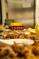 Detailed view of fried squid. Ideal for marketing campaigns of restaurants and menus with fish specialties.