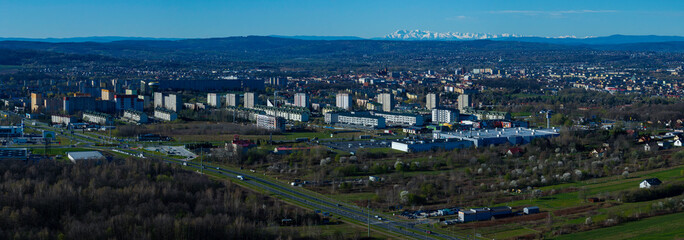 Panorama from above of Tarnów at the foothill of the Tatra Mountains covered in snow