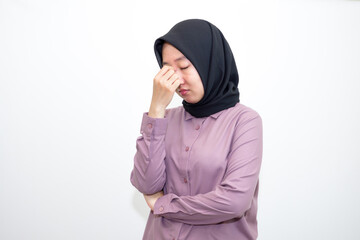 Asian, young Indonesian woman dizzy, girl headache or migraine suffering from vertigo, holding head...