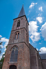 Fototapeta premium Slotkapel Kasteel (Castle chapel) in historic Castle De Haar (Kasteel de Haar, 1892) near Utrecht. Chapel features elaborate stonework and exquisite stained-glass windows. Haarzuilens, the Netherlands