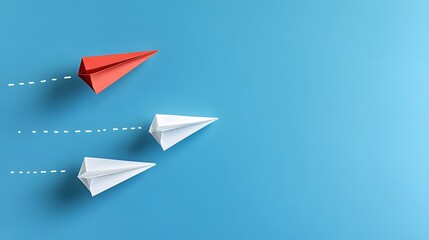 Red paper plane leading two white paper planes on blue background, symbolizing leadership innovation