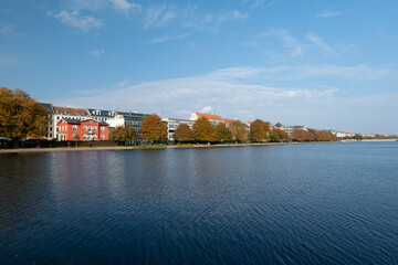 Fototapeta premium View across the lake to the different colored houses in COPENHAGEN. Incredible cityscape. This is a beautiful historical capital