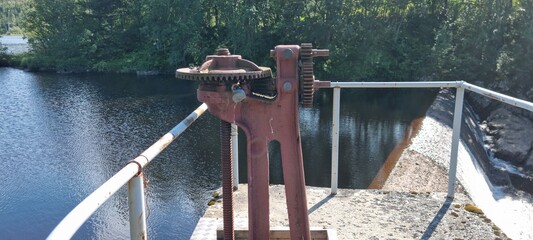 old metal sluce opening at old dam