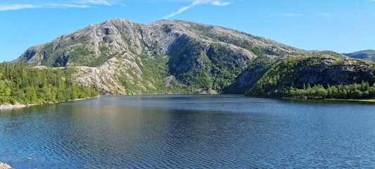serene fresh water lake in summertime in northern Norway