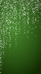Falling snowflakes christmas background. Subtle flying snow flakes and stars on christmas green background. Beautifully falling snowflakes overlay. Vertical vector illustration.