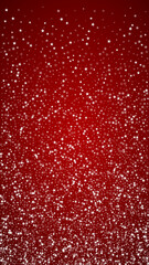 Magic falling snow christmas background. Subtle flying snow flakes and stars on christmas red background. Magic falling snow holiday scenery.   Vertical vector illustration.
