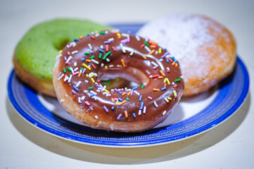 Assorted doughnuts in a box.