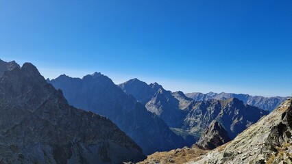 Tatry Mountains. View on top of the Rocky mountains. Rocky Mountains with clear sky. 