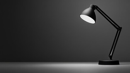 Black Desk Lamp on a Dark Surface