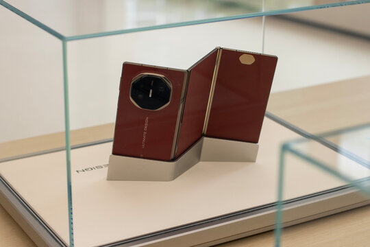 Shanghai, China - Oct 14, 2024: The new Huawei Mate XT Ultimate Design tri-fold screen smartphones are displayed at Huawei's flagship store on Nanjing East Road in Shanghai, China.