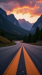 Sunrise panorama over asphalt highway meeting mountainside natural landscape