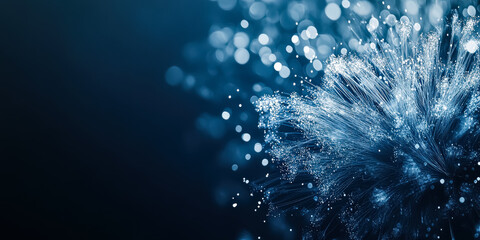 Fototapeta premium Blue background with a flower made of dots. The flower is made of many dots and is very small. christmas or new year concept