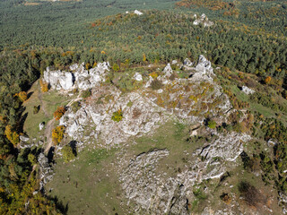 Aerial drone view of Zborow Hill, Poland. Limestone rock formation at peak of Gora Zborow, Podlesice, Poland. Krakow-Czestochowa Upland. Polish Jurassic Highland Mountainl Zborow in autumn.