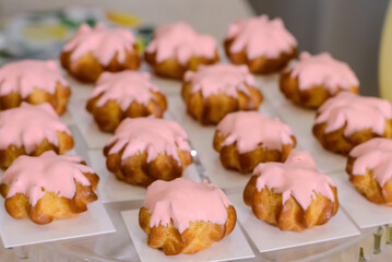 Pink eclairs on the candy bar