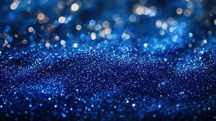 A mesmerizing display of deep sapphire blue glitter with sparkling light effects, capturing the essence of a magical night sky