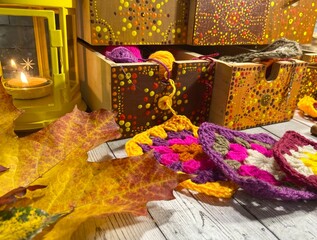 Wooden dot painted drawers with crochet granny square hooks scissors handmade craft autumn vide seasonal photo cosy home 