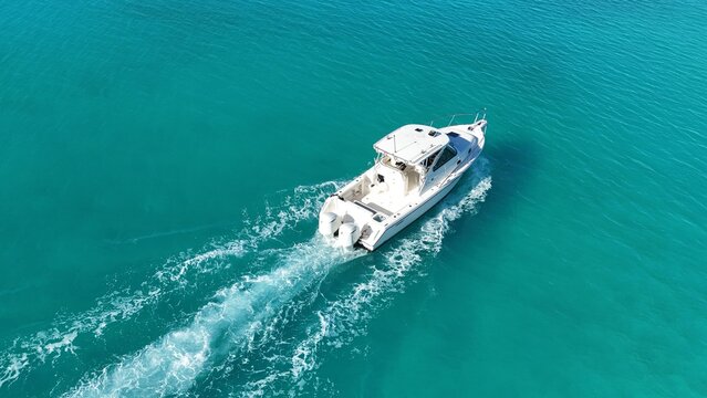Drone shot of a racing boat along the Bermudan waters