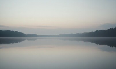 Fototapeta premium A calm lake with a cloudy sky in the background