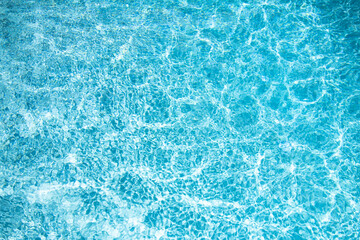 Surface of pool water. Blue sea water background texture. Water with ripples. Water waves pattern texture background. Abstract banner background.