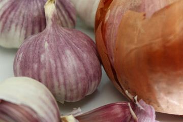 garlic and onions. foods for seasoning. garlic and onion with selective focus. natural foods used as seasoning.