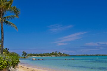 Splashing in crystal clear waters off the coast of Exuma, Bahamas