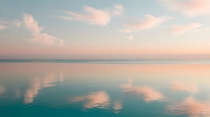 Peaceful Ocean Horizon with Soft Pastel Clouds Reflecting on Calm Water in a Tranquil Scene