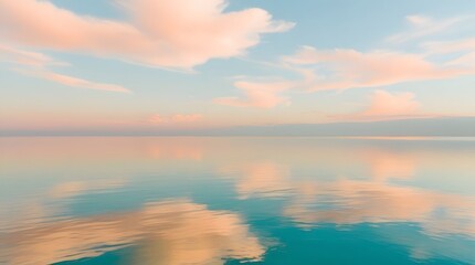 Fototapeta premium Peaceful Ocean Horizon with Soft Pastel Clouds Reflecting on Calm Water in a Tranquil Scene