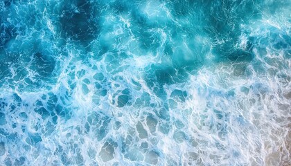 Ocean Waves Top View: Aerial view of ocean waves creating mesmerizing water patterns, perfect as a natural and calming background.