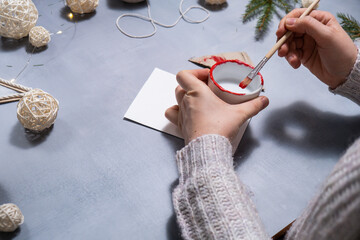 Christmas ball Storytelling of creating craft Christmas greeting card holiday present. Tactile...