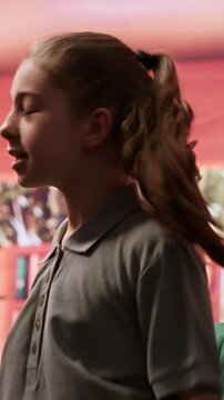 Young girl getting angry at psychologist when reviewing disturbing drawings, showing signs of murder deviant behavior. Teenager with social problems and anger management issues. Camera A.