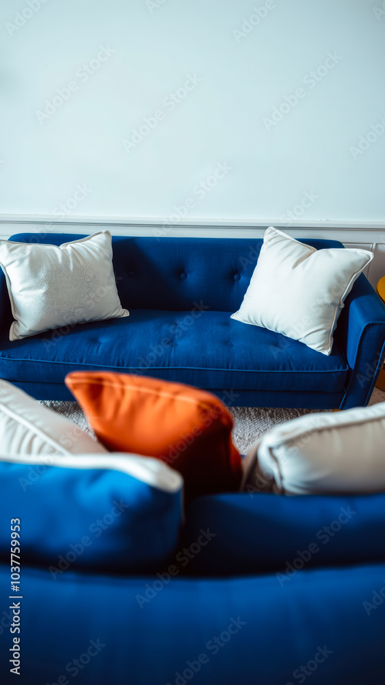 Poster blue sofa with white pillows