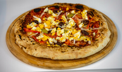 Authentic Portuguese pizza prepared with classic ingredients. Vera pizza 