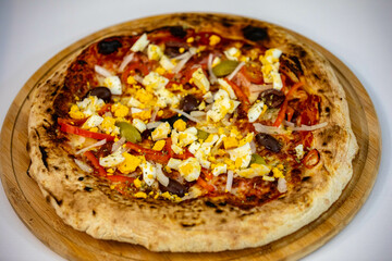 Authentic Portuguese pizza prepared with classic ingredients. Vera pizza 